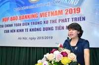 Bà Nguyễn Thị Hòa, Phó viện trưởng phụ trách Viện Chiến lược Ngân hàng, Ngân hàng Nhà nước Việt Nam phát biểu tại buổi Họp báo