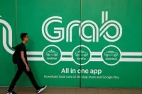 Bloomberg: Grab đang nỗ lực đàm phán tiếp quản GoTo
