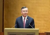 Bộ trưởng Tài chính Ngô Văn Tuấn trình bày trước Quốc hội sáng 21/4