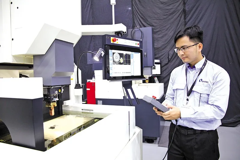 Sản xuất các sản phẩm cơ khí chính xác tại Công ty Makino (Nhật Bản) tại Khu công nghệ cao TP.HCM. Ảnh: Lê Toàn 