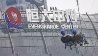 Bom nợ TPDN 300 tỷ USD của Evergrande (Trung Quốc) phát nổ năm 2021 gây rúng động thị trường tài chính toàn cầu. Ảnh: EPA