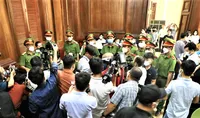 Phóng viên tác nghiệp tại một phiên tòa. Ảnh:Tạpchitoaan .vn