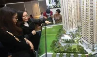 Có nên giãn lộ trình siết tín dụng bất động sản?