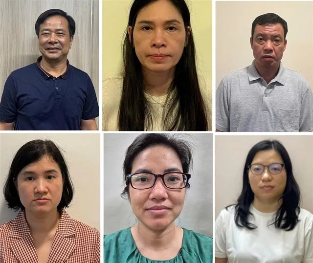 Vợ chồng Nghiêm Quốc Hưng, Phạm Thị Hạnh (Kế toán trưởng Công ty Cung ứng nhân lực Hoàng Long) và một số bị can. Ảnh: BCA