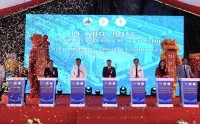 Các đại biểu thực hiện nghi thức khởi động Dự án Nhà ở xã hội Khu chung cư An Phú.