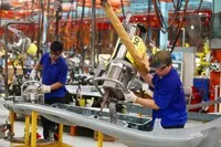 Một doanh nghiệp sản xuất công nghiệp hiện phải tuân thủ đồng thời quy định của hàng chục luật. Ảnh minh họa