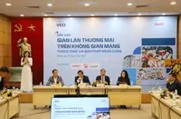 Các đại biểu tại Diễn đàn “Gian lận thương mại trên không gian mạng, thách thức và giải pháp" tại VCCI, chiều 30/12.