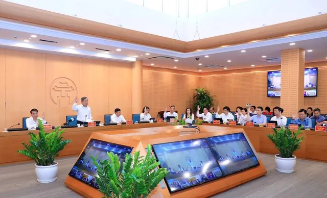 Tập thể UBND TP. Hà Nội biểu quyết thống nhất thông qua các nội dung theo Chương trình.