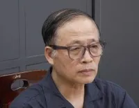 Bị can Vũ Minh Châu, nguyên Tổng giám đốc Công ty TNHH Bảo Tín Minh Châu. Ảnh: CAHN