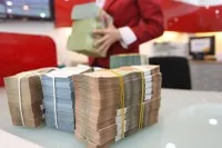 Hiện gánh nặng cung cấp vốn cho doanh nghiệp và nền kinh tế đang đè lên vai các ngân hàng