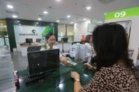 Nhóm ngân hàng quốc doanh đồng loạt báo lãi lớn năm qua
