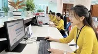 Kho bạc Nhà nước hướng tới việc thực hiện giải quyết thủ tục hành chính hoàn toàn trên môi trường điện tử. Ảnh tư liệu.