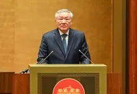 Phó Thủ tướng Thường trực Chính phủ Nguyễn Hòa Bình báo cáo tại Hội nghị.