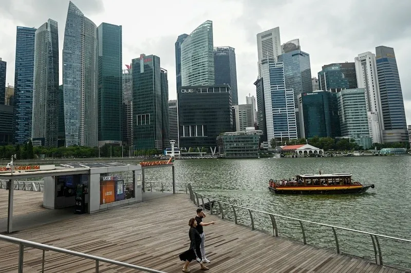 Bộ Thương mại và Công nghiệp Singapore đã hạ dự báo tăng trưởng GDP năm 2025 của nước này xuống còn 0 - 2%. Ảnh: AFP