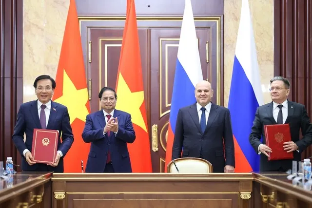 Thủ tướng Phạm Minh Chính và Thủ tướng Liên bang Nga Mikhail Mishustin chứng kiến Lễ ký kết Hiệp định về hợp tác xây dựng Nhà máy điện hạt nhân trên lãnh thổ Việt Nam - Ảnh: VGP/Nhật Bắc