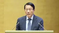 Bộ trưởng Bộ Công an Lương Tam Quang trình bày báo cáo. Ảnh: Duy Linh.