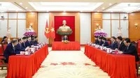 Quang cảnh cuộc điện đàm. (Ảnh: TTXVN)
