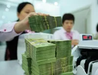 Một lượng lớn trái phiếu doanh nghiệp được phân phối qua hệ thống ngân hàng. Ảnh: Đ.T