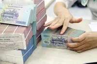 Dù thừa vốn, ngân hàng đang có xu hướng thắt chặt điều kiện vay, định giá tài sản khắt khe. Ảnh: Đức Thanh