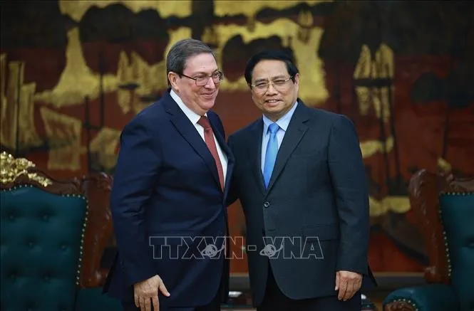 Thủ tướng Phạm Minh Chính tiếp đồng chí Bruno Rodríguez Parrilla, Ủy viên Bộ Chính trị, Đặc phái viên Đảng, Chính phủ Cuba, Bộ trưởng Bộ Ngoại giao Cuba. Ảnh: Dương Giang/TTXVN
