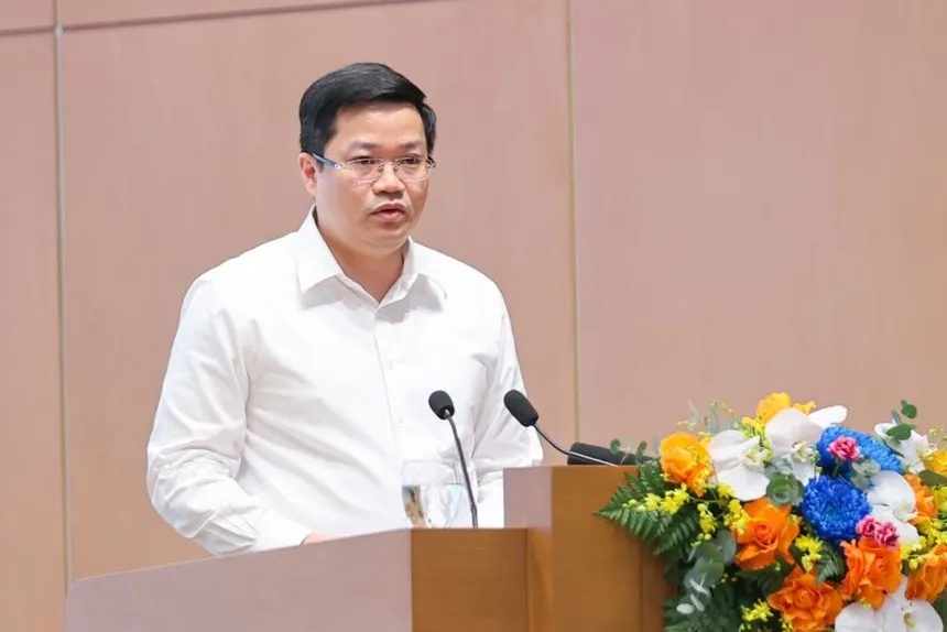 Thứ trưởng Bộ Tài chính Nguyễn Đức Tâm trình bày báo cáo tại Hội nghị. Ảnh Nhật Bắc 